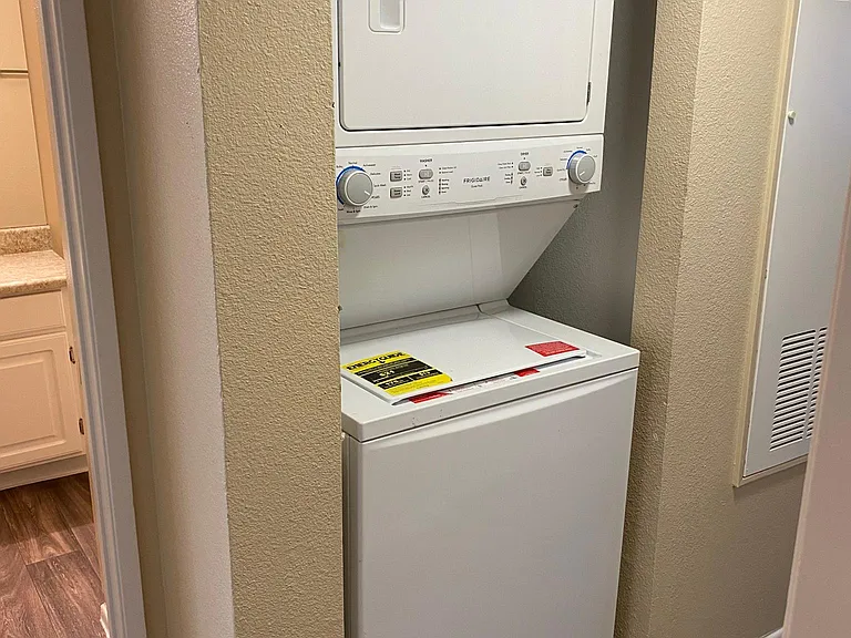downstairs 2 bedroom - laundry center in hall