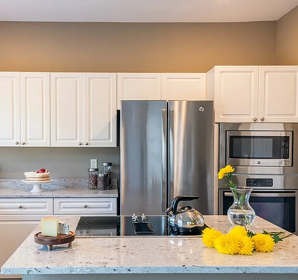 Kitchens feature custom touches like kitchen islands and breakfast bars