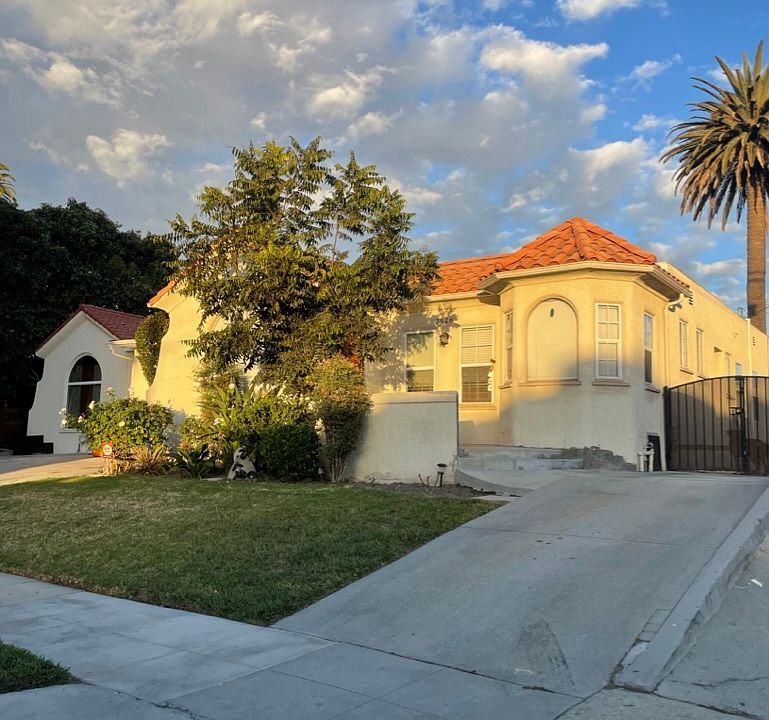 Front view with driveway.