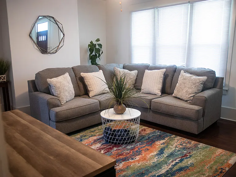 Spacious Livingroom with lots of natural light.