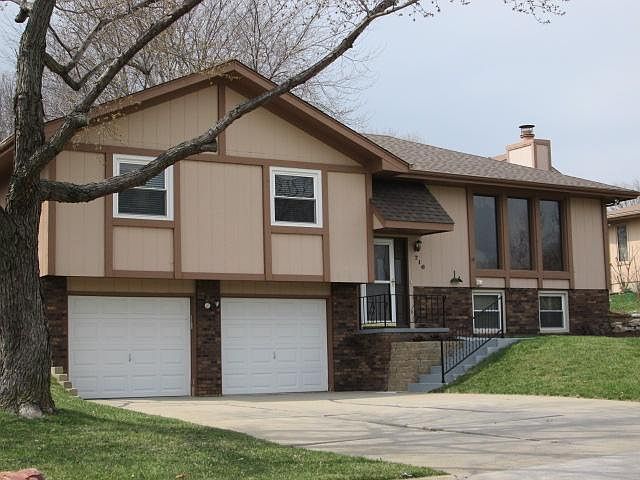 Exterior front with 2 car garage
