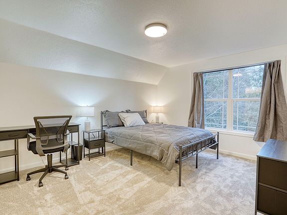 Work space with comfortable office chair provided.