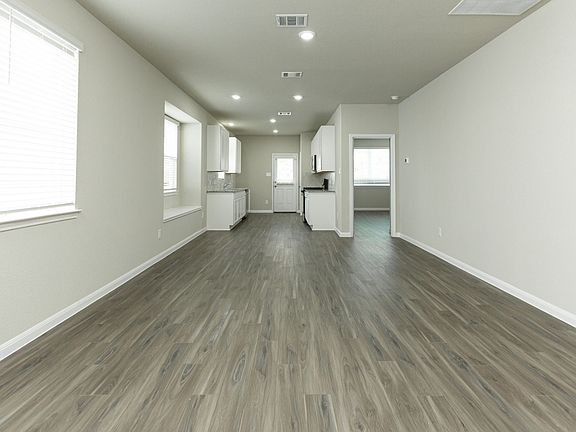 Family Room to Dining Area and Kitchen