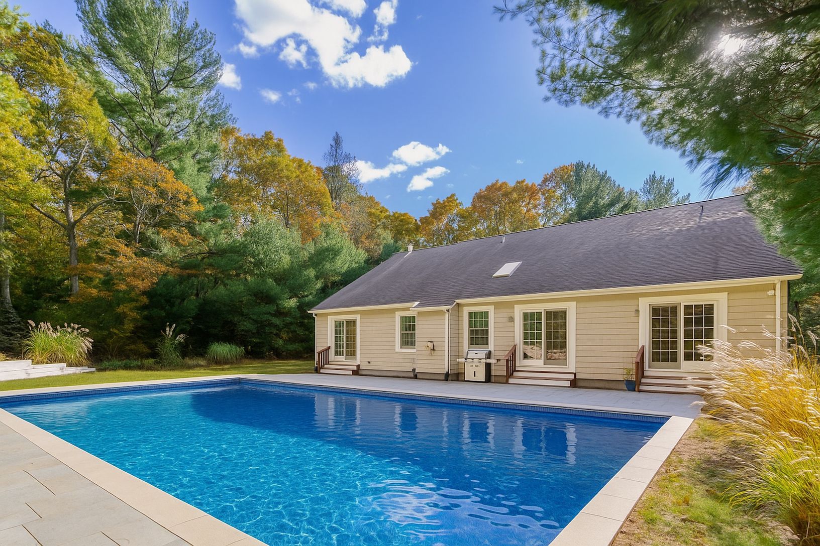  Inviting heated pool surrounded by bluestone patio