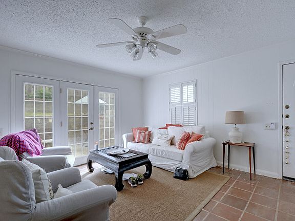 Living room with doors to private patio