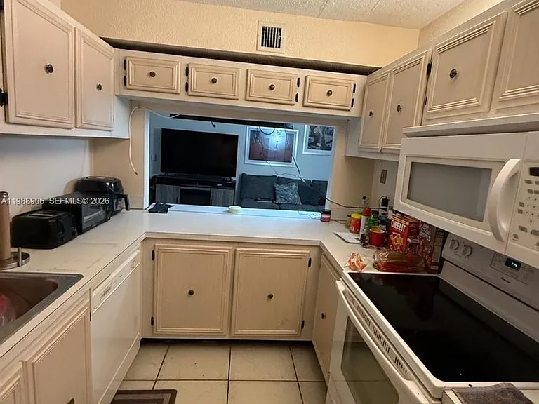 9441 Live Oak Pl #209 — Photo 3