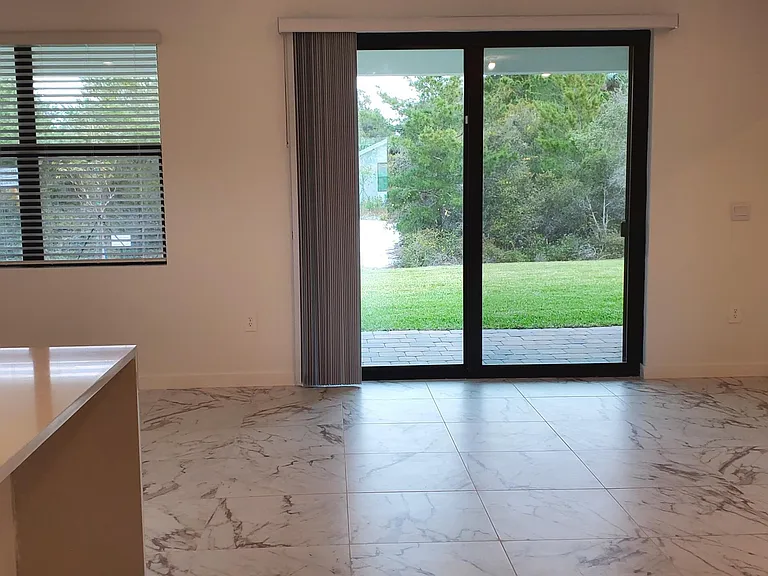 1949 NE Ocean Dunes Dr — Photo 16