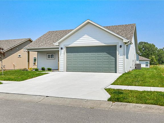 2nd image of 1301 NE White Oaks Ln