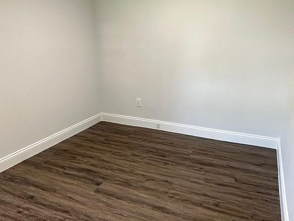 room is about 9X12. fits a full size bed with a night stand