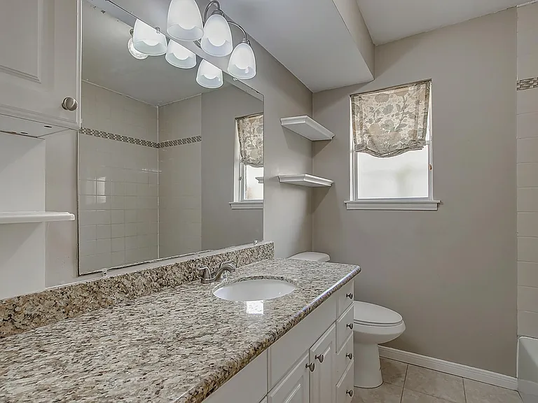 main bath has granite counter