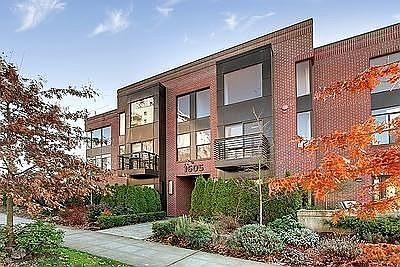 1605 East Pike-The Opal. A 6 unit brick clad boutique-stle condominium building. #203 is on SE corne