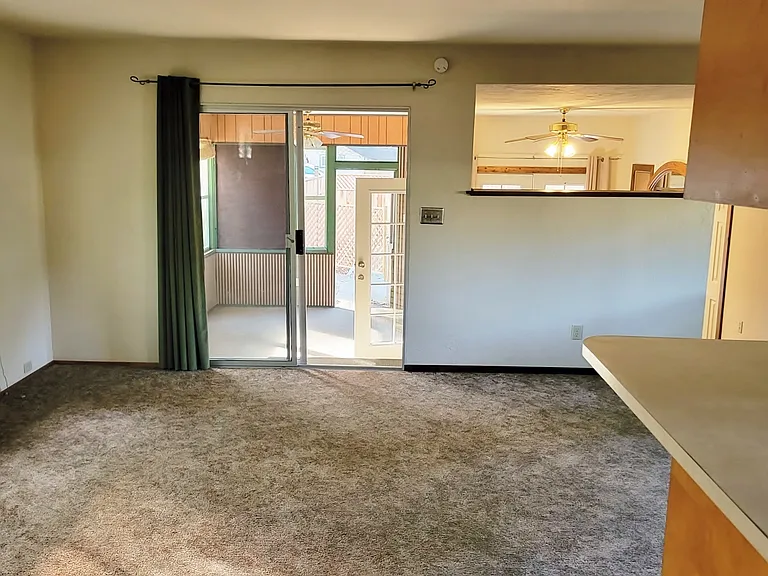 Living room - sliding door leads to screened in porch