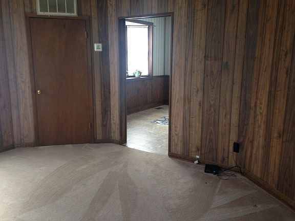 Living room leads to kitchen