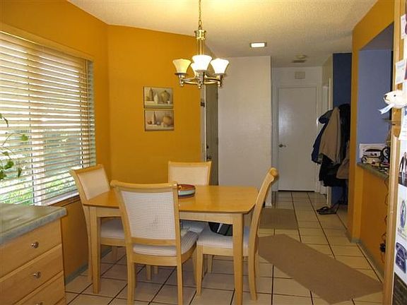 Nice Dining area looking towards 1/2 bath, coat closet & indoor laundry rm.
