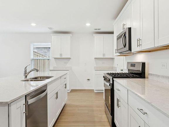 Spacious kitchen with abundant cabinet space