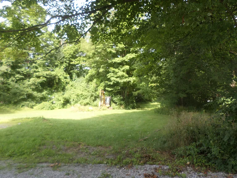long back yard, along a year round stream is down that path