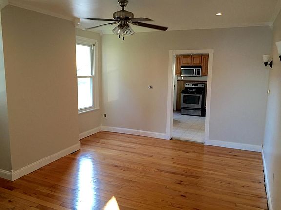 Dining Room with hardwood & ceiling fan