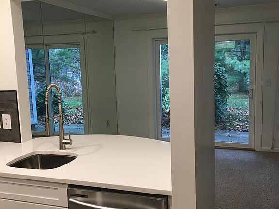 new kitchen looking towards dining room and outside