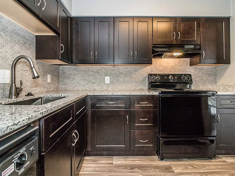 Cook with ease in your updated kitchen featuring stylish cabinetry and modern finishes.