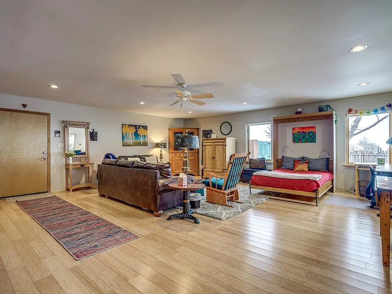 400 square foot bonus room /family room with fold out full size Murphy bed for guests