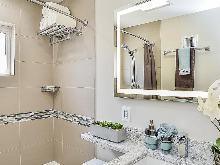 Lighted bath mirror