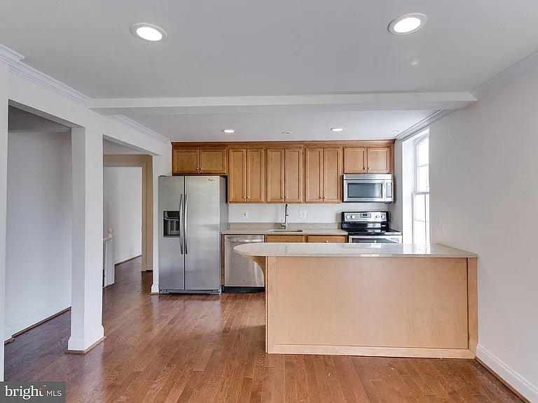 Eat-in Kitchen looking to the front of the property with plenty of dining space and room for a desk or reading nook.