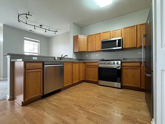 Kitchen with new ss appliances