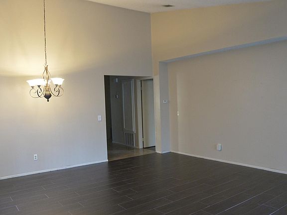 Dining/living room with wood plank tile