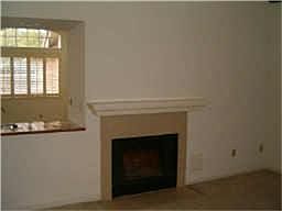 Living area with gas fireplace.
