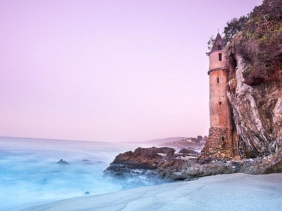 Nearby Victoria Beach (tower shown)