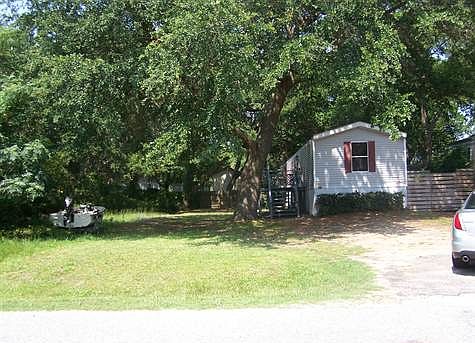 Plenty of space. Vacant lot to left on corner