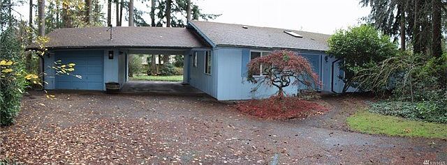 Vintage Rambler on large private lot close to shopping, schools and freeway access.