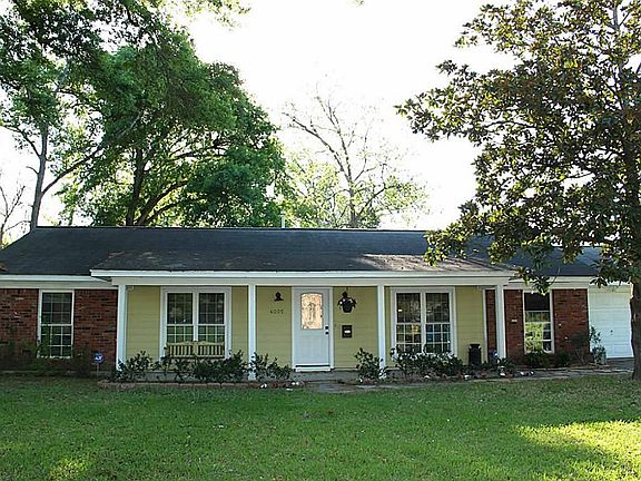 Charming House in coveted Spring Branch area with a 13,600 square foot lot, front porch, back deck, 