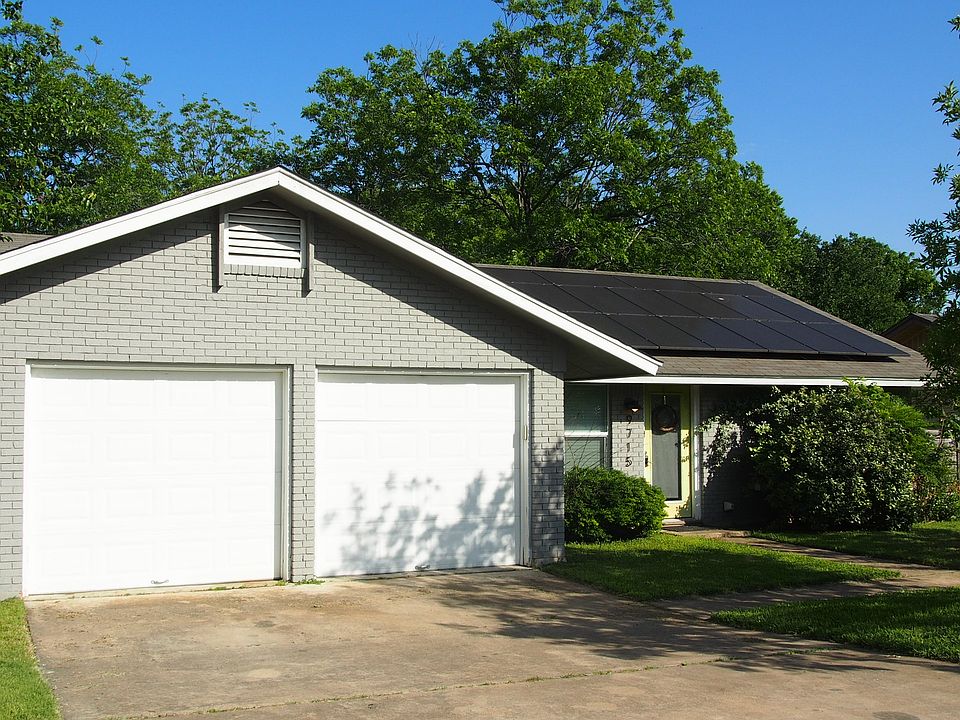 Front of house, garage view.