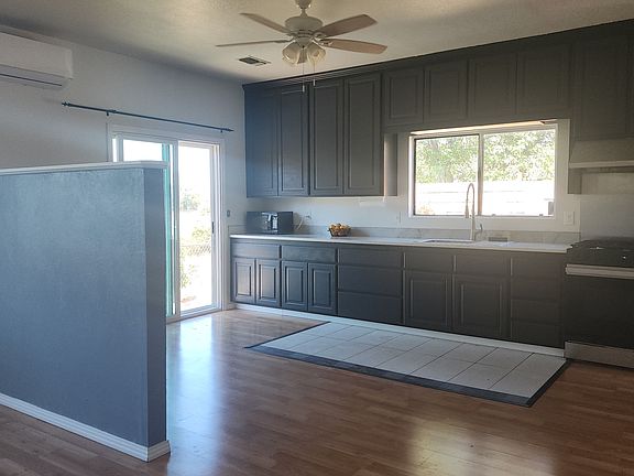 Full Kitchen with High End appliances, granite countertops and floor to ceiling cabinets for plenty of storage space