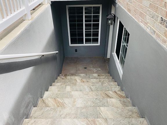 Tiled entry staircase