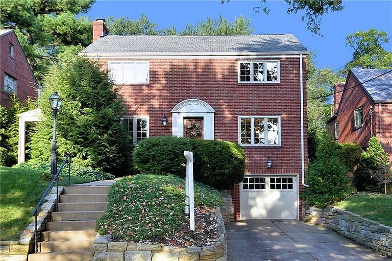 Exterior Front - Lovely three bedroom, one full and two half bath home with a gorgeous kitchen and family room all-brick additio