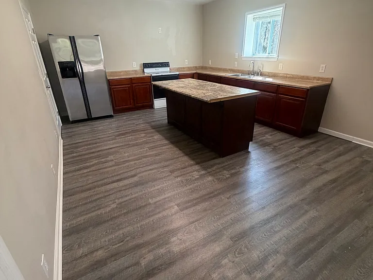 Large Kitchen with plenty of storage and counter space.