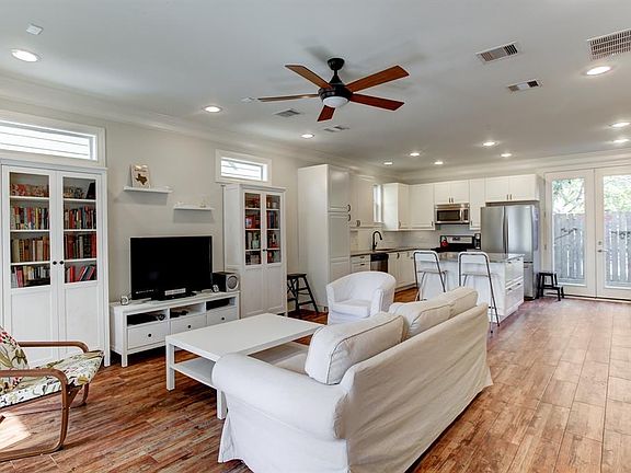 Living Room and Kitchen combo. French door lead to backyard Patio