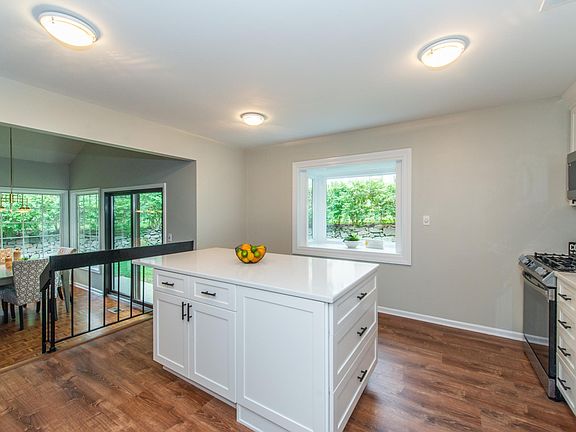 Kitchen Opens to Dining and Living Room
