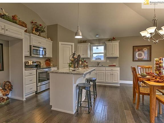 Plenty of counter and storage space.  Pantry is straight ahead through doorway.