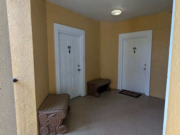 entrance to unit, trash pickup available and dumpster on site
