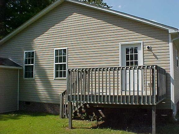 rear of home showing wooden deck