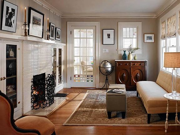 Living room with view to sunroom.