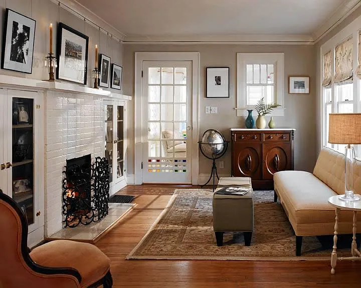 Living room with view to sunroom.