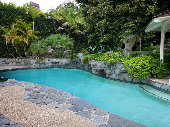 Pool with Water Features & Waterfall