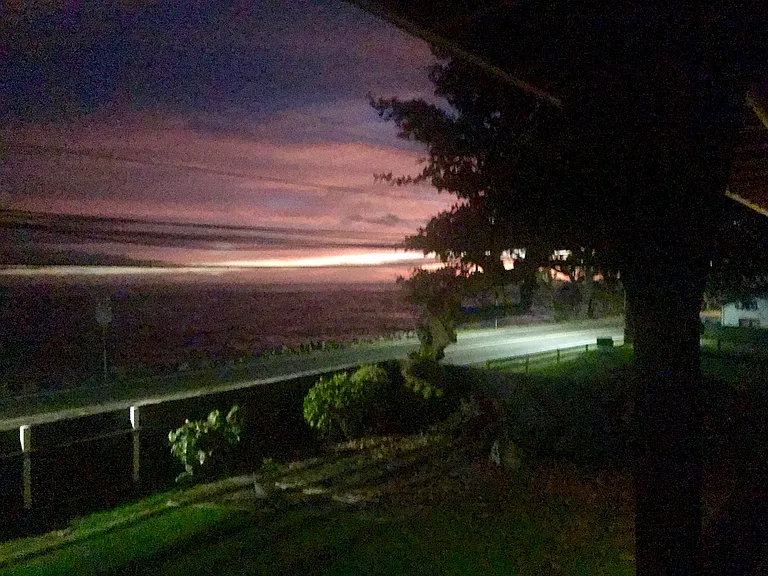Night photo of ocean from rental