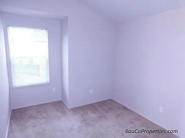 8646 NE Hyde Park Ln — Photo 14