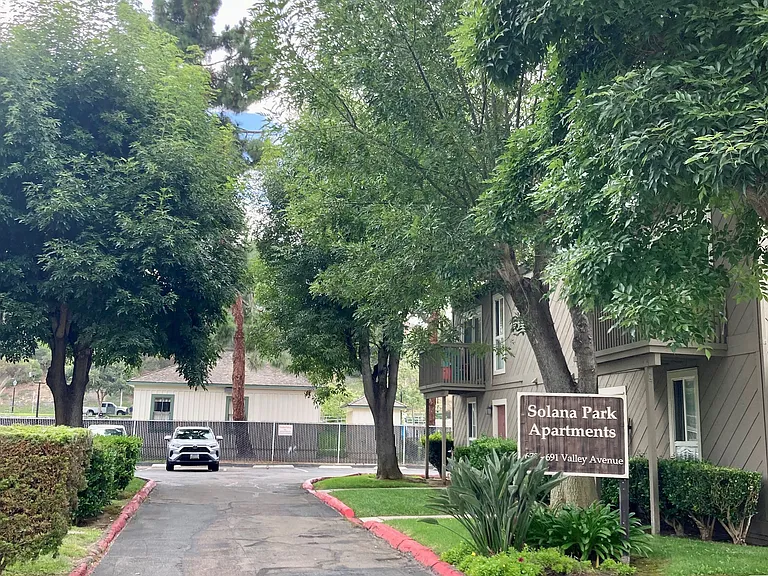 Front entry to Solana Park Apartments in Solana Beach, California.