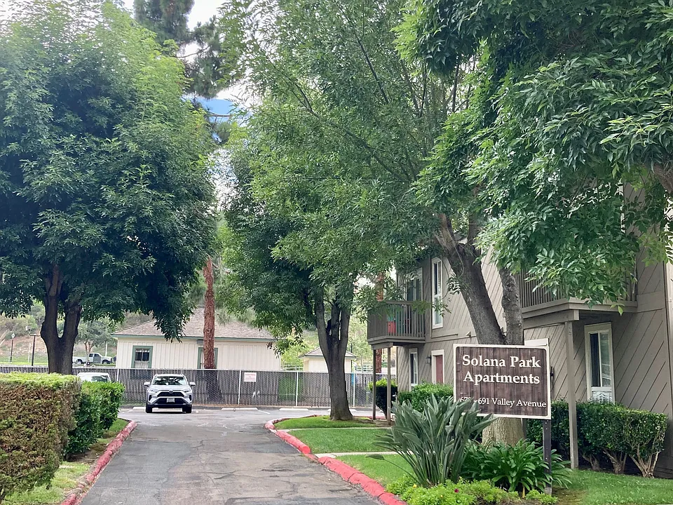 Front entry to Solana Park Apartments in Solana Beach, California.